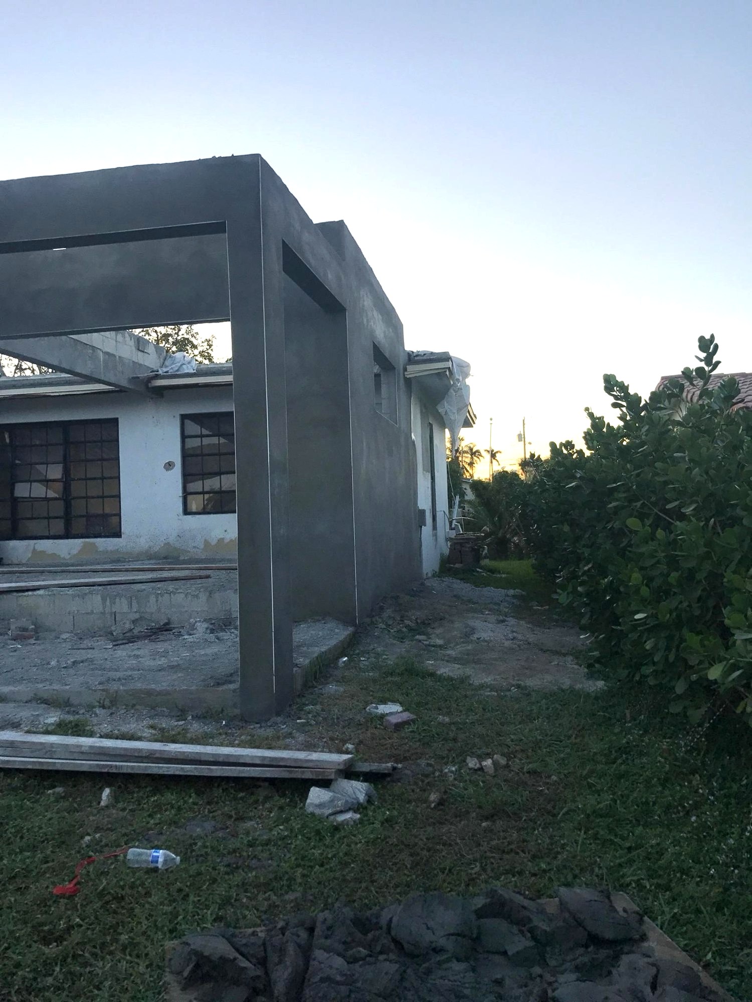 Side elevation of the new block structure at full height with the parapet formed