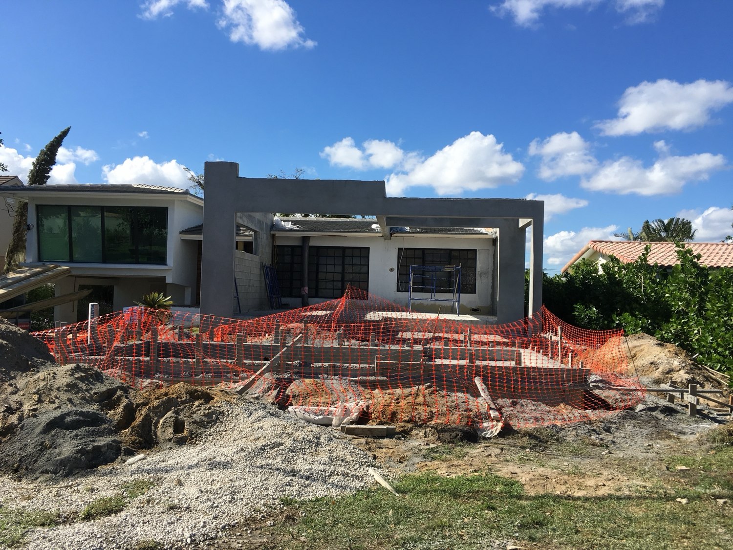 The pool excavation and the new block structure seen from the yard