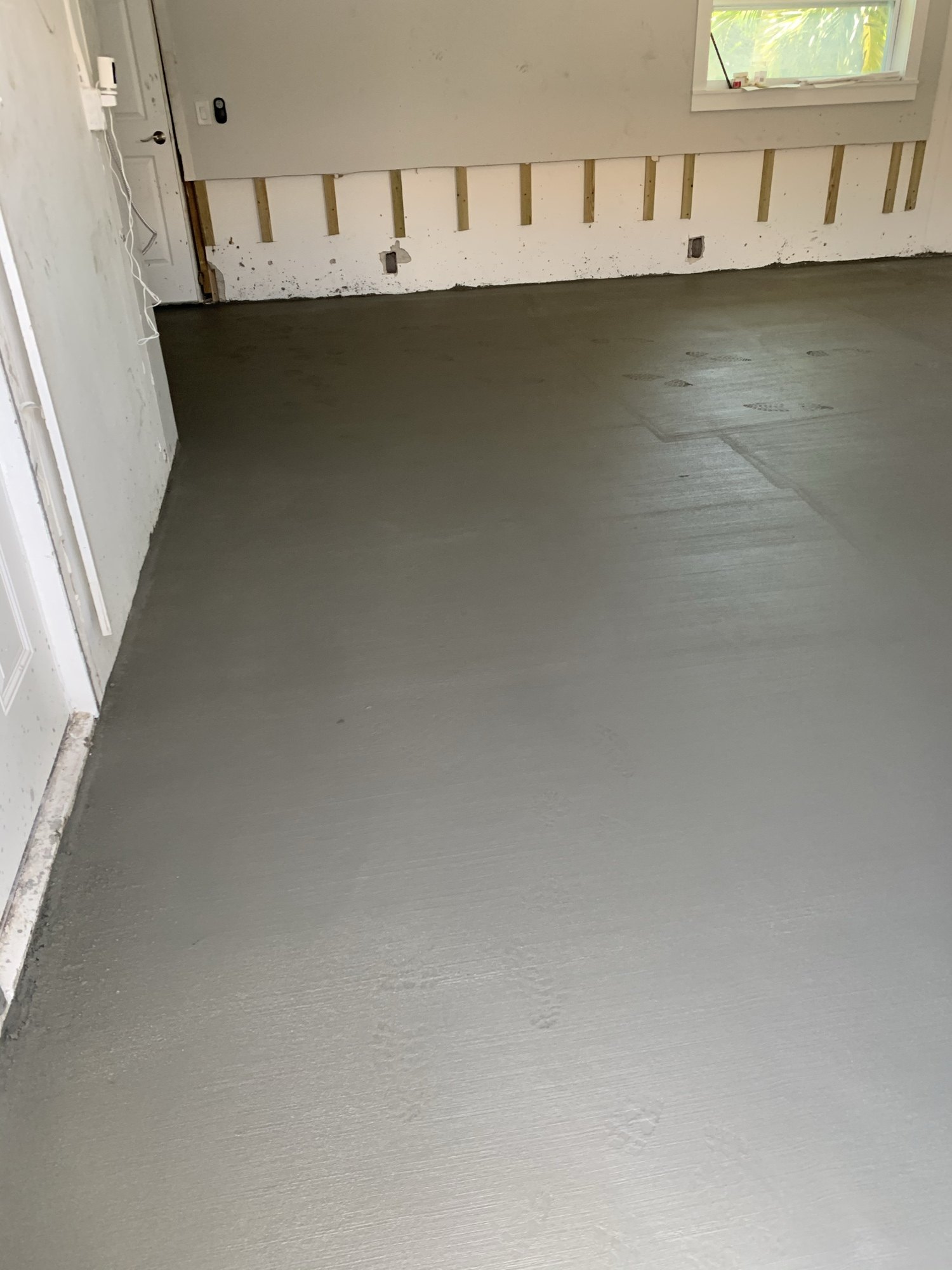 Interior slab after self-levelling compound has been poured and cured