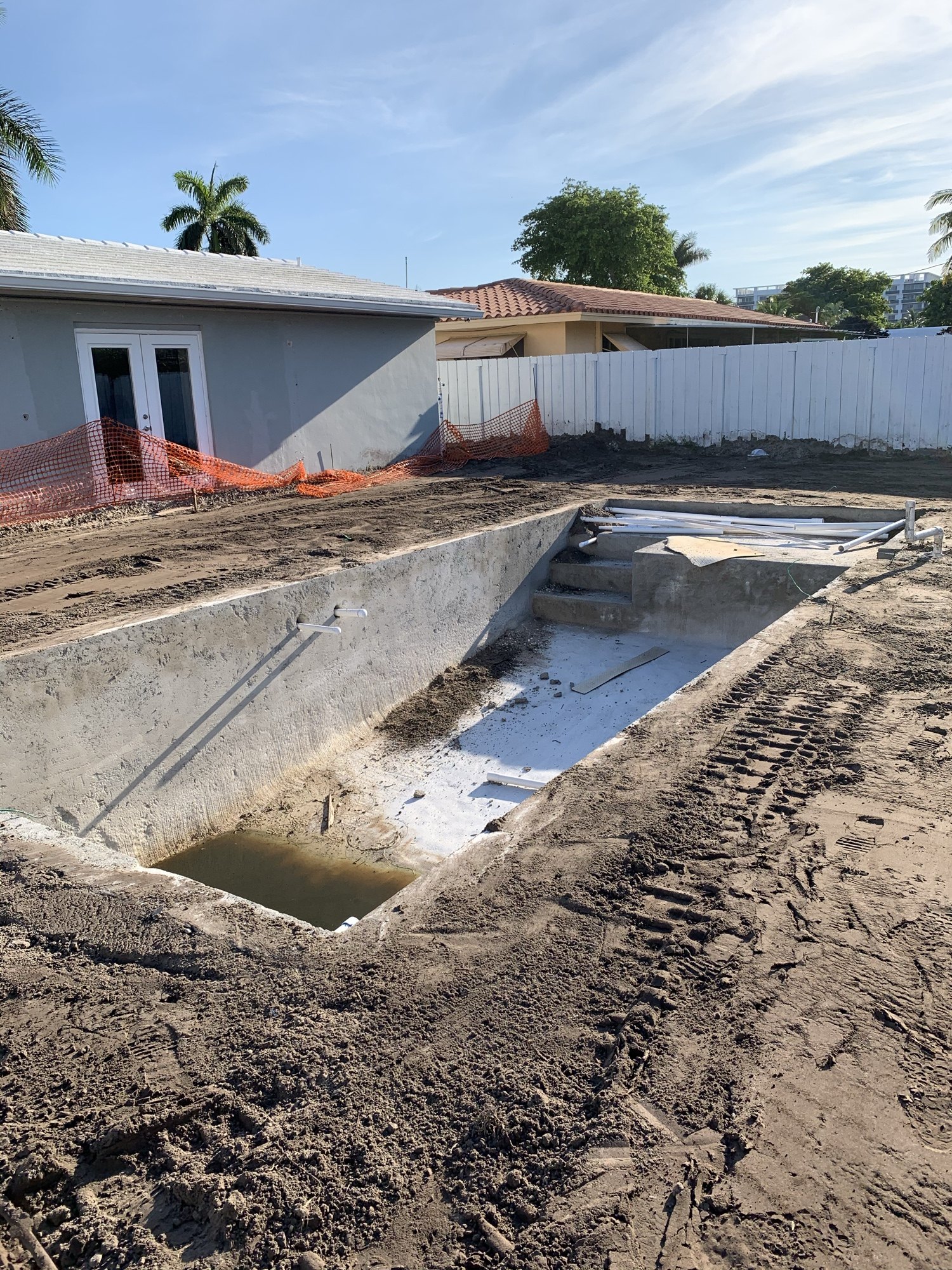 Sprayed concrete pool shell after excavation and steel