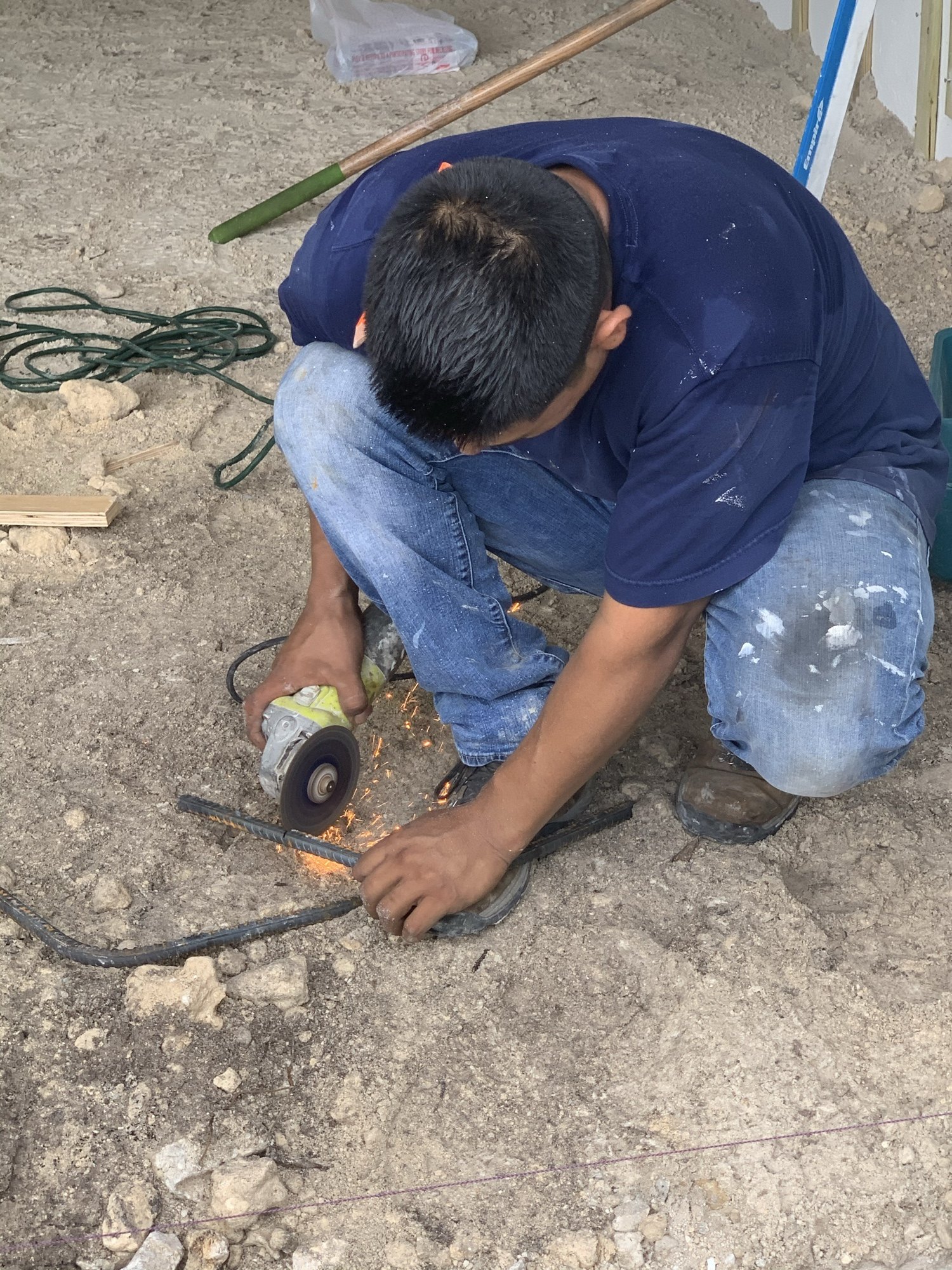 Soldering a copper connection during the plumbing rough-in