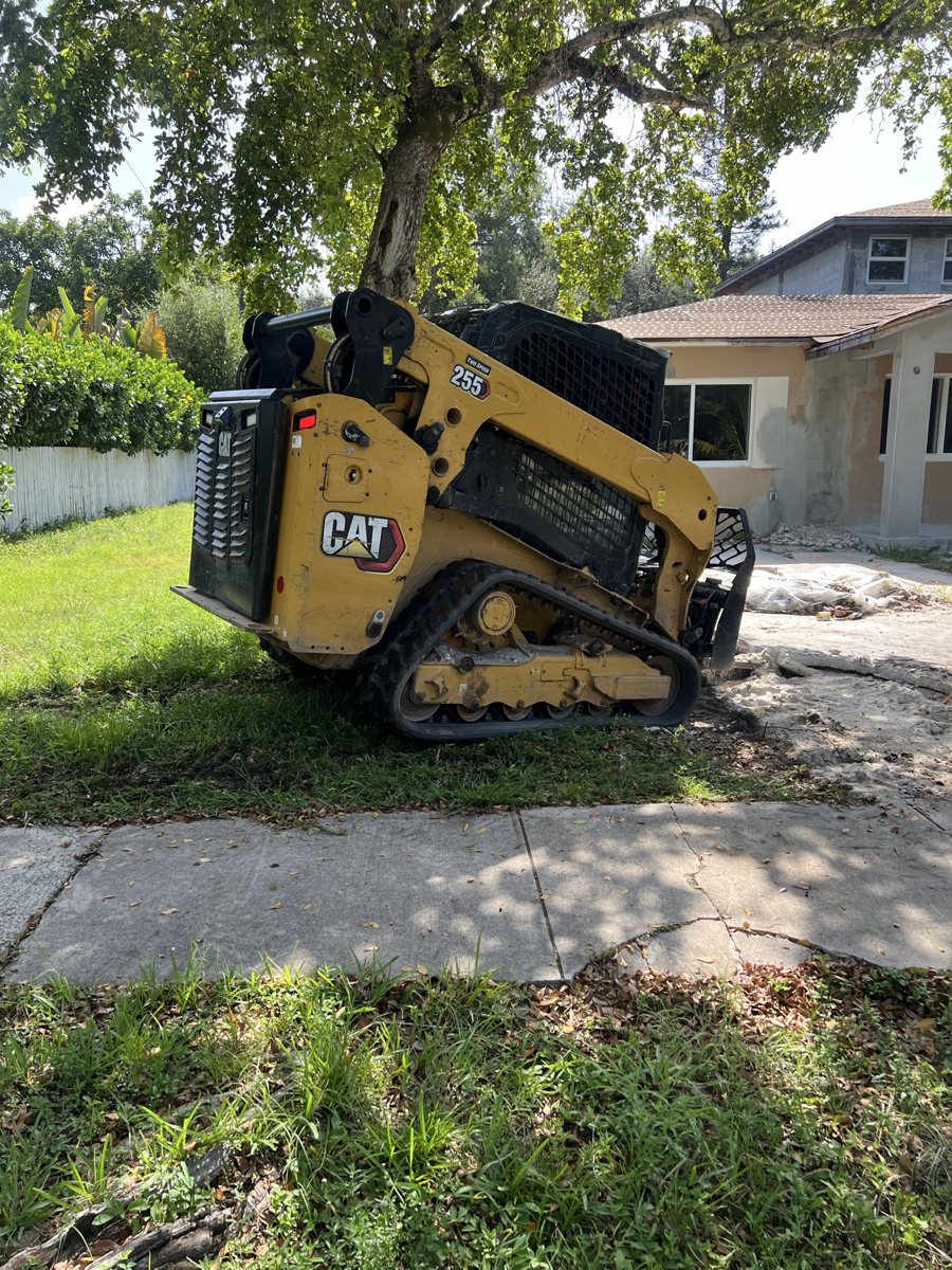 Caterpillar 255 compact track loader on site at a residential renovation